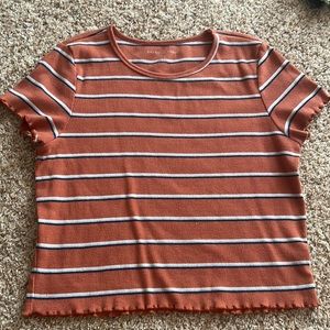 american eagle, large, rusty color with navy blue, light blue, and white strips.